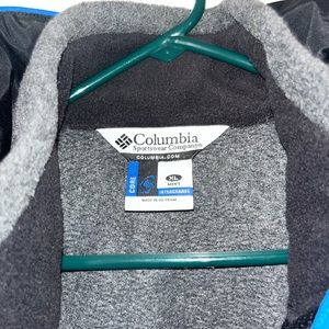 Blue and black Columbia jocket. Perfect for those seeking comfort and style.